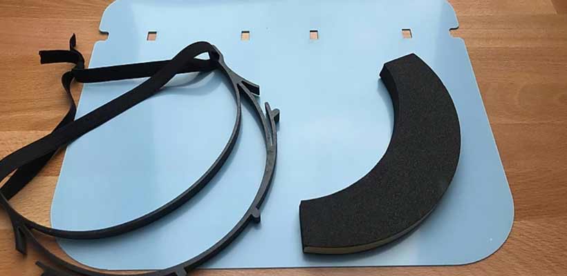 Flat packed face visor