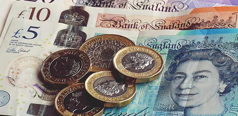 currency-fluctuations-affect-packaging-costs A collection of pound coins and notes