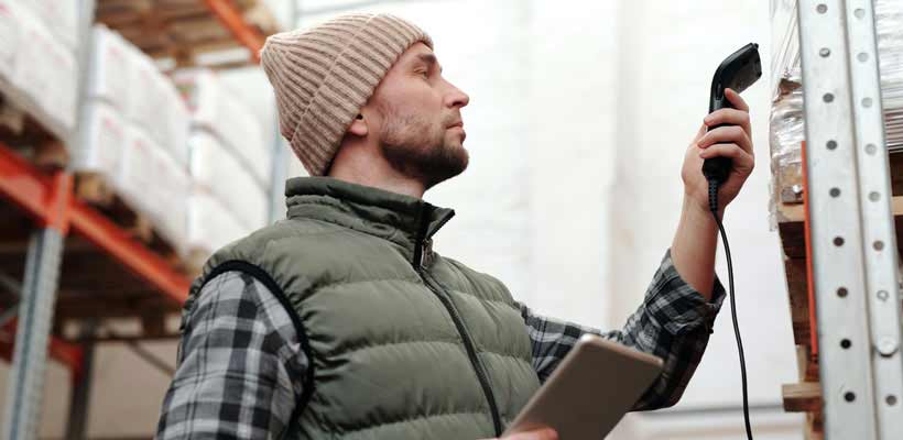 A warehouse operative carrying out advanced picking tactics