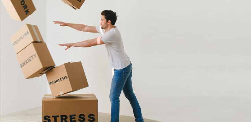 mind-employer Man pushing over cardboard boxes