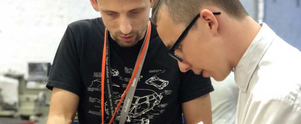 Ben Edmonds with a student