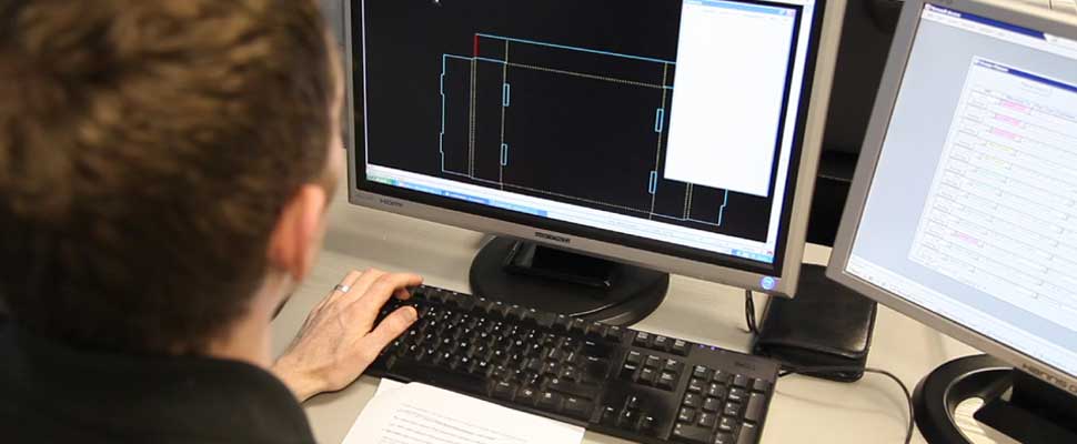 Sustainable packaging design A packaging designer working on CAD software