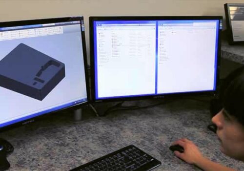 A GWP designer creating packaging on a CAD system