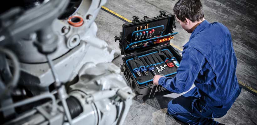 Aerospace engineer working with tools