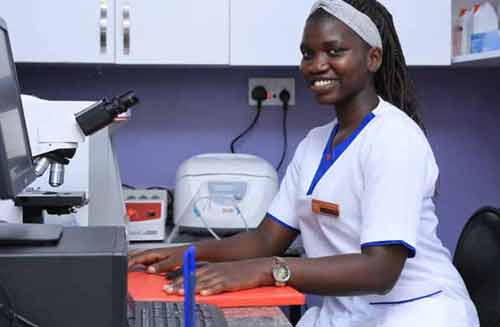 MMN Doctor with medical equipment supplied by MMN charity