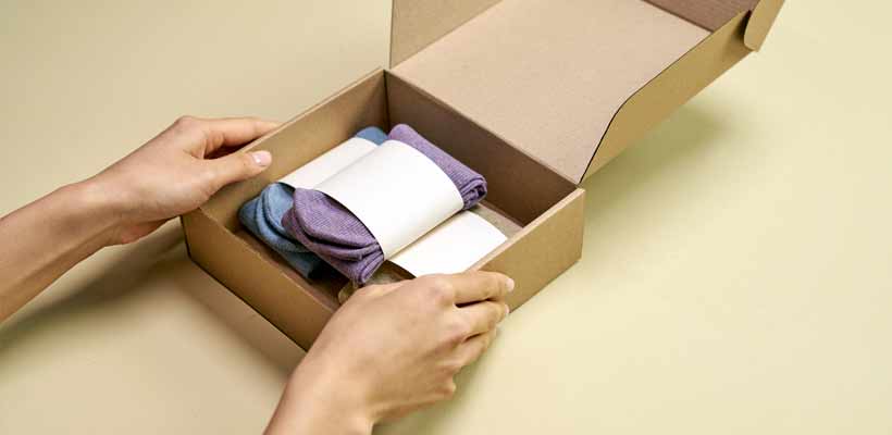 Sustainable packaging consumer behaviour A cardboard box used for an eCommerce delivery