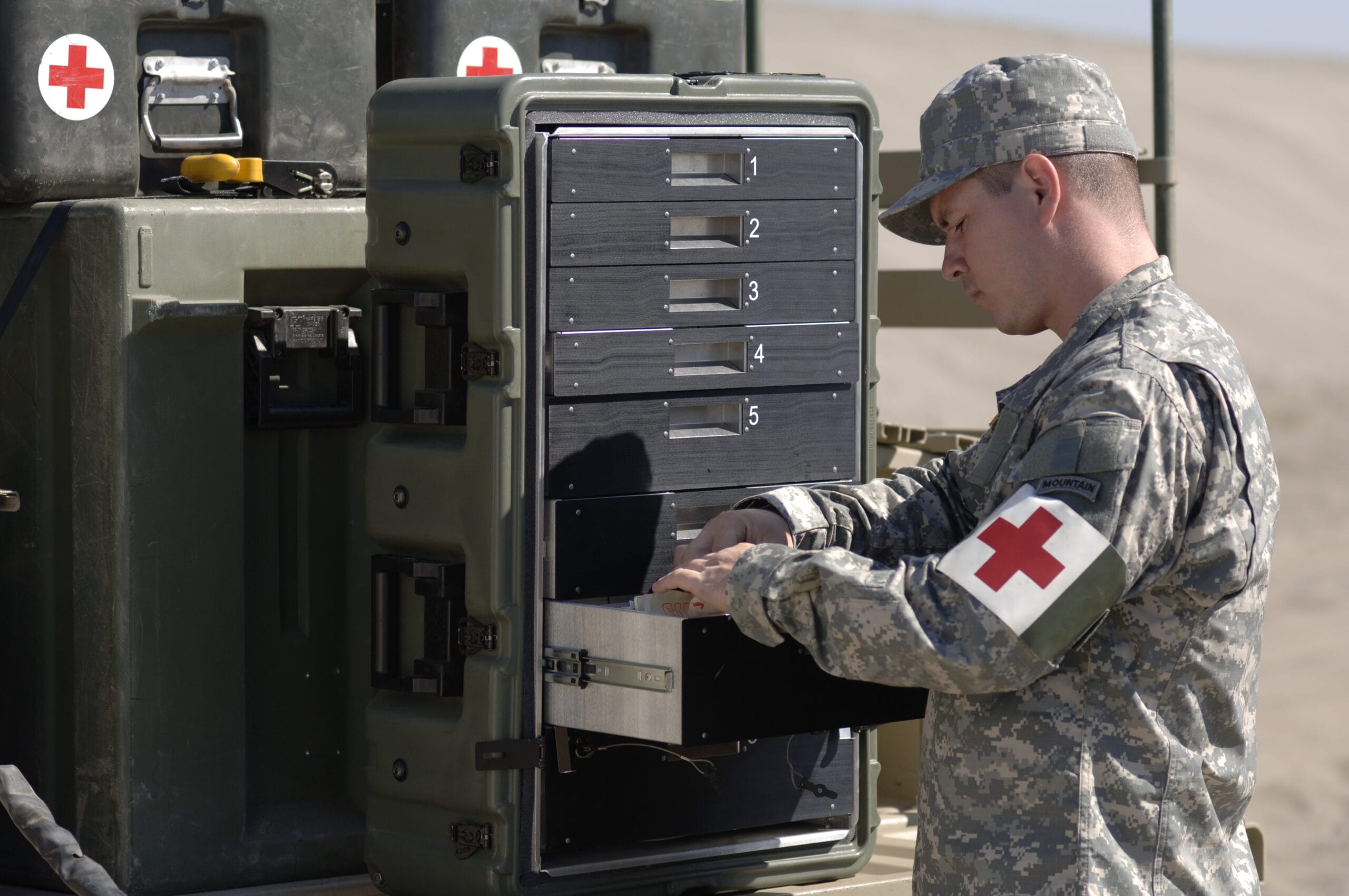 Roto-molded case in action A medic removing supplies from a roto-molded case.