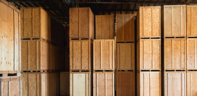 Large wooden export crates Wooden export crates in a dark warehouse