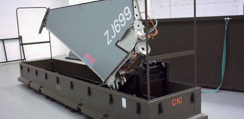 Def-stan packaging A large aircraft part in specialist packaging
