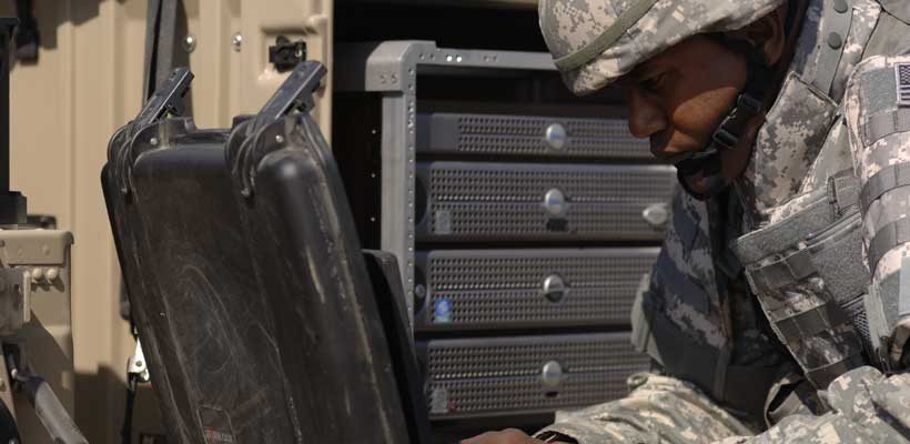 military-level-packaging A person in the army using specialist packaging cases.