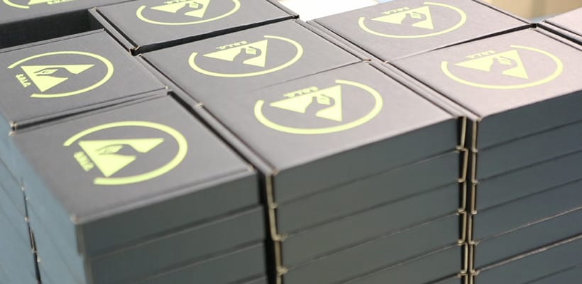 A stack of Corstat boxes printed with an ESD logo