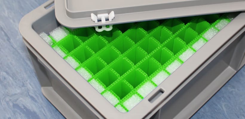 Green Correx dividers inside a grey Euro container