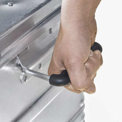 A person holding a li-on battery case handle.