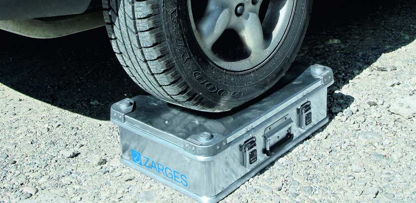 Zarges K470 equipment cases An offroad vehicle running over a Zarges K470 equipment case.