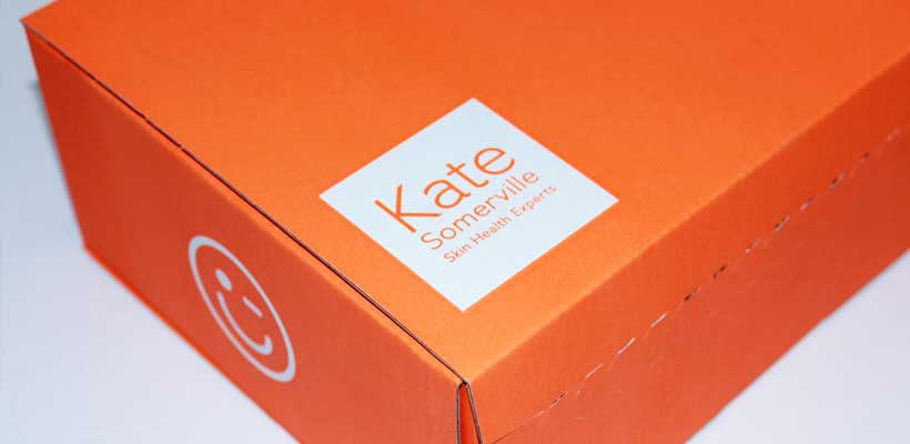 Brand colours An orange and white printed cardboard box.