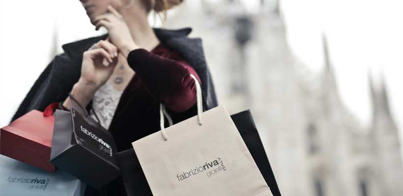 Branded bags A shopper carrying branded bags.
