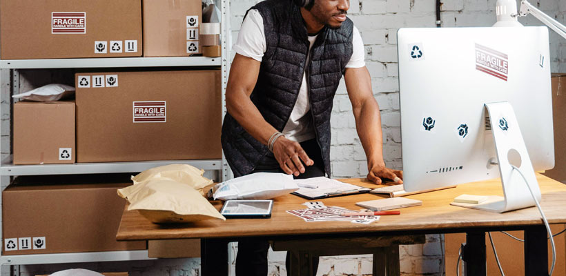A person packing eCommerce orders
